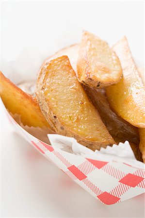 potato wedges - Potato wedges in cardboard container Stock Photo - Premium Royalty-Free, Code: 659-03527023