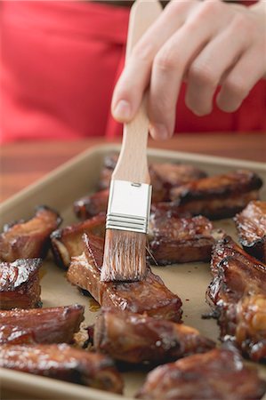 pork rib - Glazing pork ribs Stock Photo - Premium Royalty-Free, Code: 659-03527313