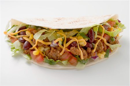 simsearch:659-03526846,k - Mince taco with cheese Stock Photo - Premium Royalty-Free, Code: 659-03527718