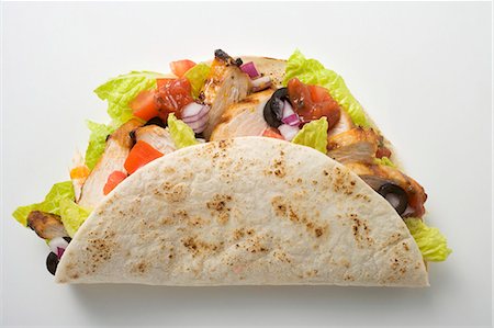 simsearch:659-03524467,k - Chicken taco Foto de stock - Royalty Free Premium, Número: 659-03527721