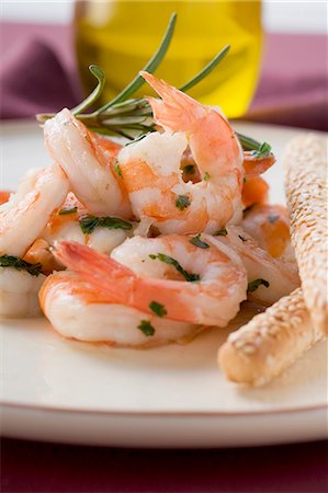 simsearch:659-03531046,k - Fried prawns with rosemary and sesame grissini Stock Photo - Premium Royalty-Free, Code: 659-03528075