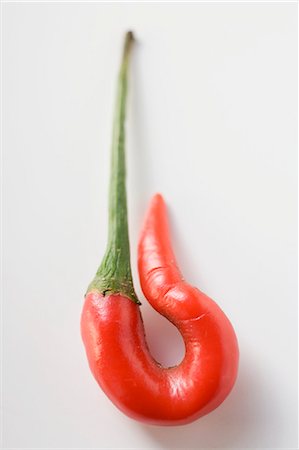 pepper cut out - Curled red chilli Stock Photo - Premium Royalty-Free, Code: 659-03528093