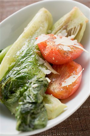 simsearch:659-06307190,k - Braised romaine lettuce with tomatoes and Parmesan Stock Photo - Premium Royalty-Free, Code: 659-03528273