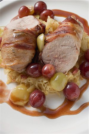 Pheasant breast with bacon, sauerkraut and grapes Stock Photo - Premium Royalty-Free, Code: 659-03528355