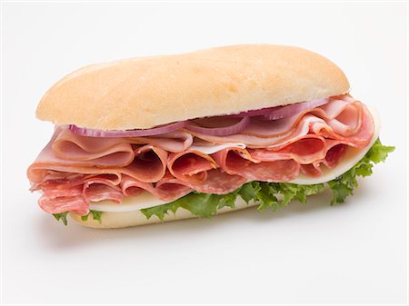 simsearch:659-01846593,k - Ham, salami and cheese sub sandwich Fotografie stock - Premium Royalty-Free, Codice: 659-03528457