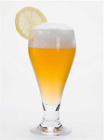 simsearch:659-03527539,k - Glass of shandy with slice of lemon (UK) Stock Photo - Premium Royalty-Free, Code: 659-03528488