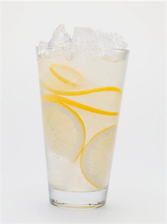 A glass of lemonade with crushed ice Stock Photo - Premium Royalty-Free, Code: 659-03528499