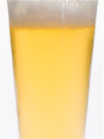 simsearch:659-03527532,k - Glass of lager (detail) Foto de stock - Sin royalties Premium, Código: 659-03528490