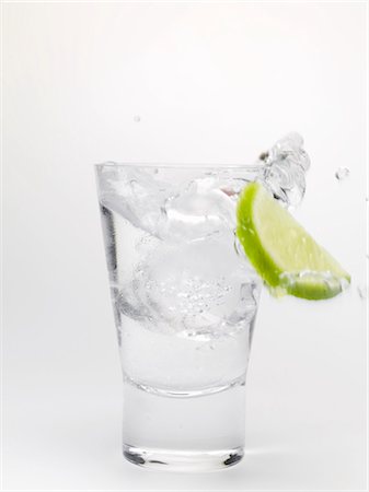 Water splashing out of a glass Stock Photo - Premium Royalty-Free, Code: 659-03528508