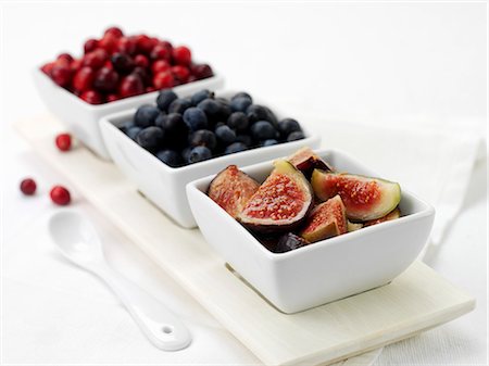 small bowl - Fresh figs and berries in dishes Stock Photo - Premium Royalty-Free, Code: 659-03528545