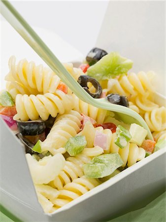 fast food delivery dish - Fusilli with vegetables in take-away container (close-up) Stock Photo - Premium Royalty-Free, Code: 659-03528556