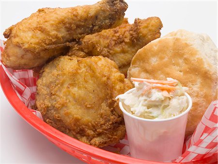 fried food - Fried chicken with coleslaw and scone in plastic basket Stock Photo - Premium Royalty-Free, Code: 659-03528593