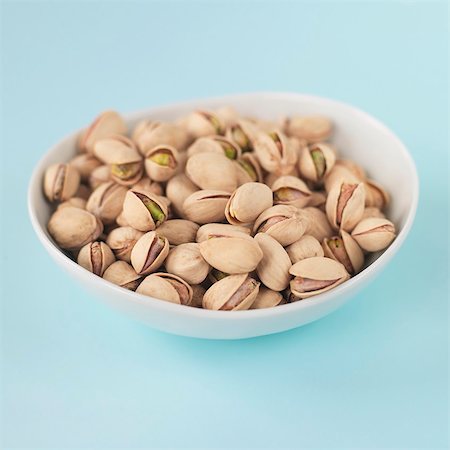 pistachio - Pistachios in a dish Stock Photo - Premium Royalty-Free, Code: 659-03528664