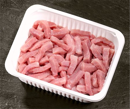 simsearch:659-01843908,k - Strips of pork in plastic container Stock Photo - Premium Royalty-Free, Code: 659-03528716