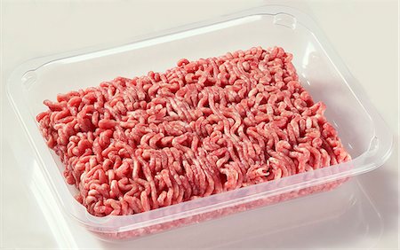 Fresh mince in plastic container Foto de stock - Sin royalties Premium, Código: 659-03528718