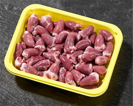 simsearch:659-03528720,k - Chicken hearts in plastic container Stock Photo - Premium Royalty-Free, Code: 659-03528719