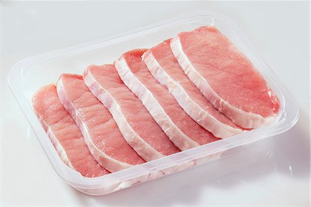 puerco - Minute steaks in plastic container Foto de stock - Sin royalties Premium, Código: 659-03528726