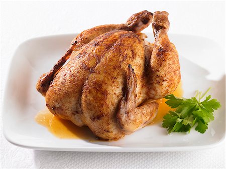 Whole roast chicken Fotografie stock - Premium Royalty-Free, Codice: 659-03528760