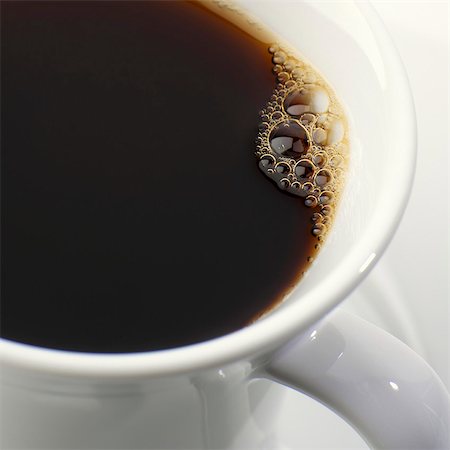 Black coffee with bubbles Stock Photo - Premium Royalty-Free, Code: 659-03528833