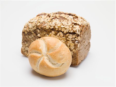 Wholemeal bread and bread roll Stock Photo - Premium Royalty-Free, Code: 659-03528942