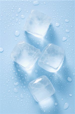 Four ice cubes from above Stock Photo - Premium Royalty-Free, Code: 659-03529001