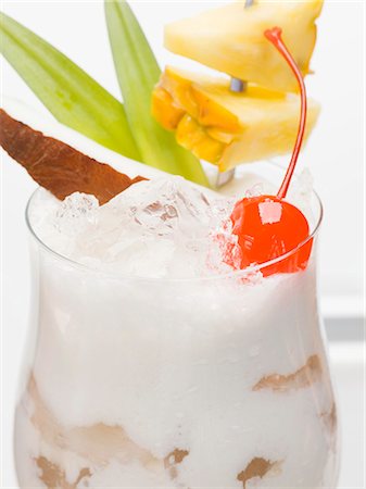 pineapple coconut - Piña Colada with ice cubes Stock Photo - Premium Royalty-Free, Code: 659-03529098