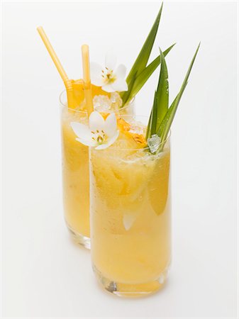 pineapple - Two pineapple drinks Stock Photo - Premium Royalty-Free, Code: 659-03529103