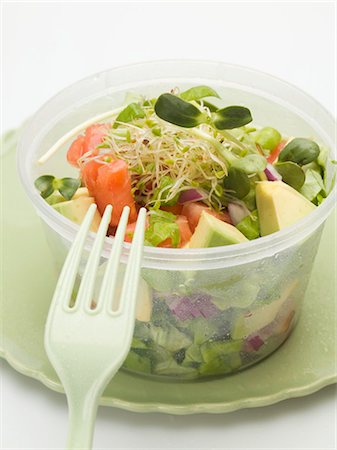 salad in container - Avocado salad with sprouts in plastic container with fork Stock Photo - Premium Royalty-Free, Code: 659-03529157