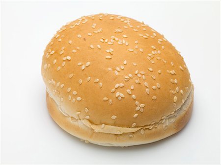 A hamburger bun with sesame seeds Stock Photo - Premium Royalty-Free, Code: 659-03529150