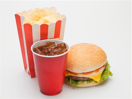 simsearch:659-01847504,k - Cheeseburger, crisps and cola Stock Photo - Premium Royalty-Free, Code: 659-03529163