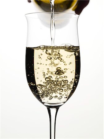simsearch:659-03531318,k - Pouring white wine into a glass Stock Photo - Premium Royalty-Free, Code: 659-03529204