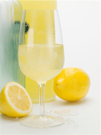 Limoncello and fresh lemons Stock Photo - Premium Royalty-Free, Code: 659-03529208