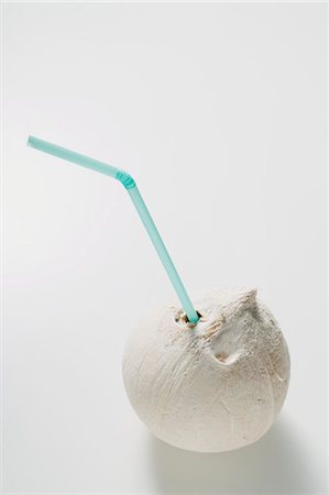 Shelled coconut with straw Stock Photo - Premium Royalty-Free, Code: 659-03529231