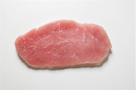 steak chunk - Minute pork loin steak Stock Photo - Premium Royalty-Free, Code: 659-03529282