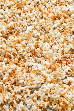 popcorn not person - Popcorn with caramel (full-frame) Stock Photo - Premium Royalty-Free, Code: 659-03529356