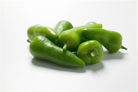 pimiento chipotle - Several green chillies Foto de stock - Sin royalties Premium, Código: 659-03529615
