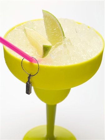 Frozen Margarita with lime wedges Stock Photo - Premium Royalty-Free, Code: 659-03529626