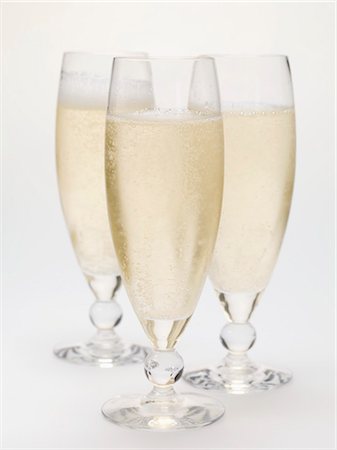 Three glasses of sparkling wine Stock Photo - Premium Royalty-Free, Code: 659-03529657