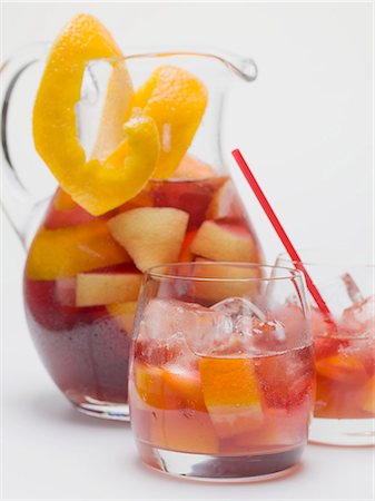 Fruity red wine punch in glass jug and glasses Stock Photo - Premium Royalty-Free, Code: 659-03529651