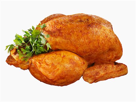 Whole roast chicken with parsley Foto de stock - Sin royalties Premium, Código: 659-03529841