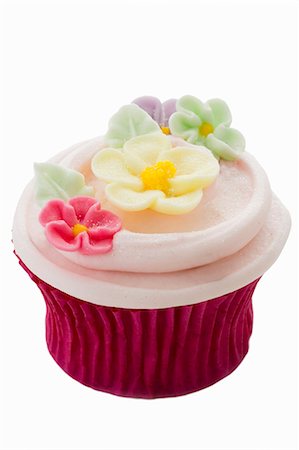 Cupcake avec fleurs de sucre de couleur Photographie de stock - Premium Libres de Droits, Code: 659-03529941