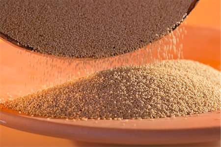 quinoa not people - Pouring amaranth out of a dish Stock Photo - Premium Royalty-Free, Code: 659-03529977