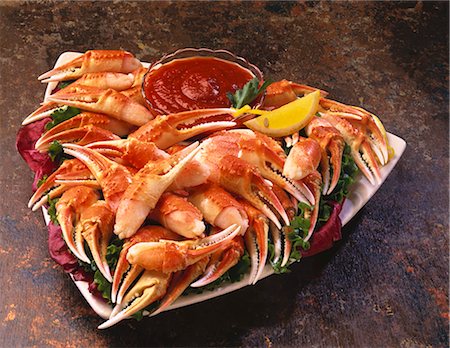 platter food party - Platter of Crab Legs with Cocktail Sauce Stock Photo - Premium Royalty-Free, Code: 659-03520882