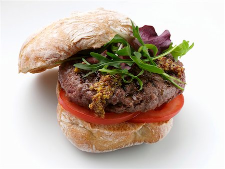 Burger de chevreuil à la roquette Photographie de stock - Premium Libres de Droits, Code: 659-03520989