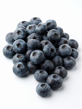 Fresh Blueberries on a White Background Stock Photo - Premium Royalty-Free, Code: 659-03521009