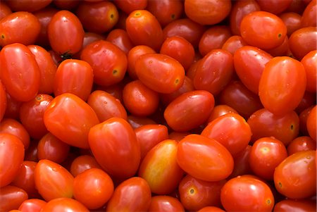 Many Fresh Grape Tomatoes Stock Photo - Premium Royalty-Free, Code: 659-03521142