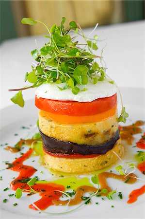 Grilled Polenta Timbale with Eggplant, Tomato and Goat Cheese Stock Photo - Premium Royalty-Free, Code: 659-03521326
