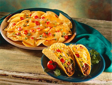 Two Beef Tacos and a Plate of Nachos Stock Photo - Premium Royalty-Free, Code: 659-03521444