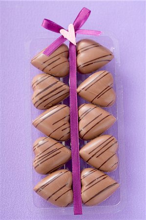 Several heart-shaped chocolates Stock Photo - Premium Royalty-Free, Code: 659-03521650