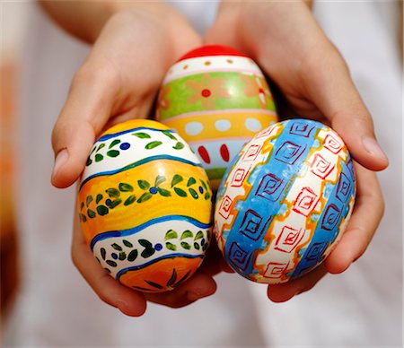 Child's hands holding three Easter eggs Stock Photo - Premium Royalty-Free, Code: 659-03521864